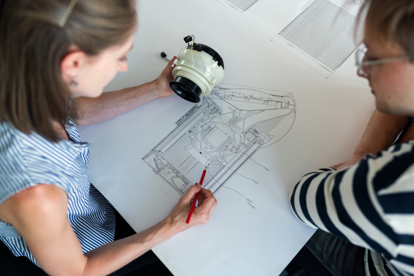 Construction professional reviewing site plans