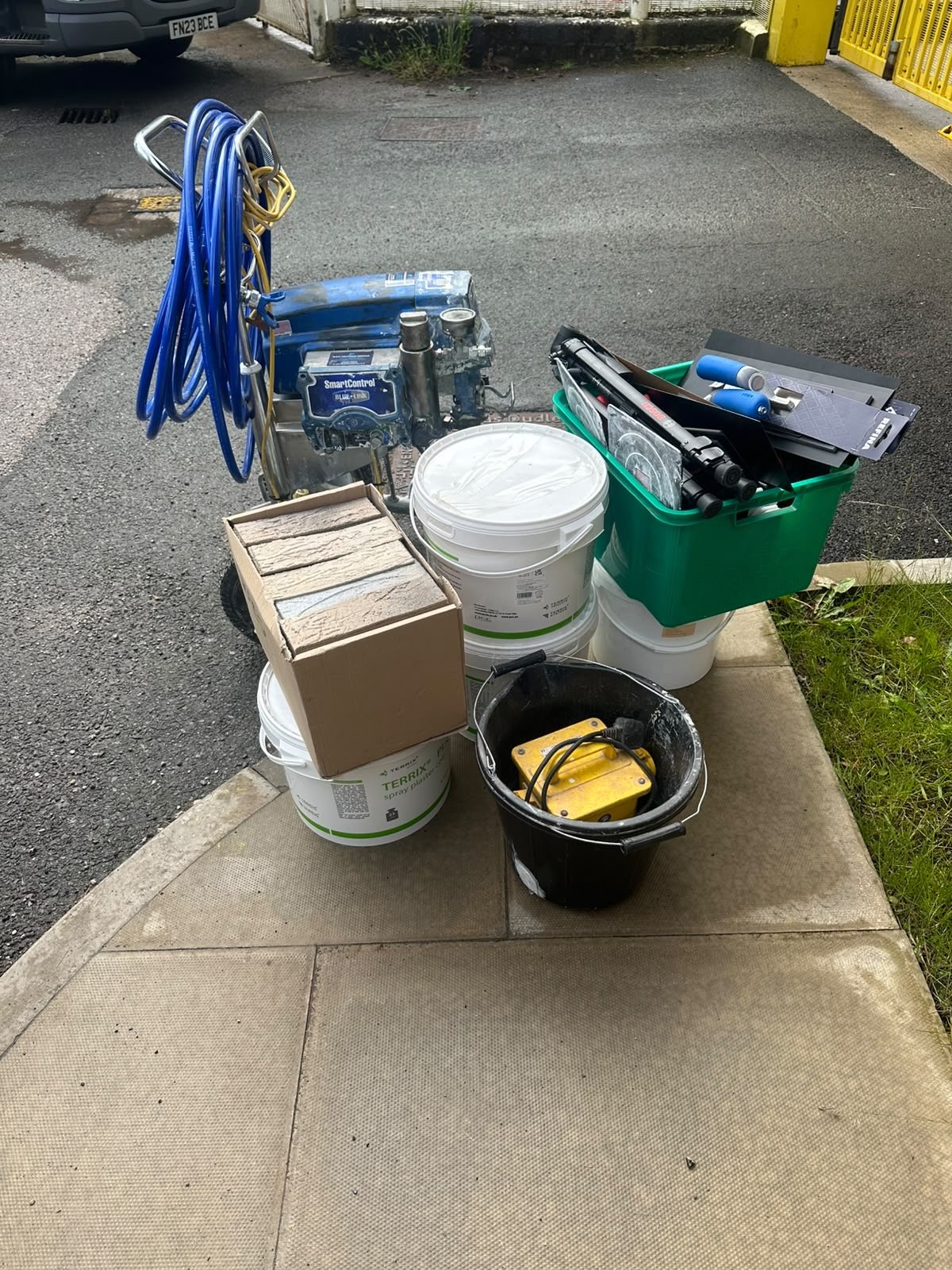 Spray plastering rig, brick slip materials and tools used by the Frameworks Social Enterprise cohort at HMP Styal